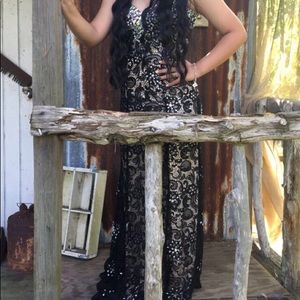 Nude and black embellished prom dress